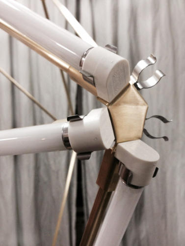 steffi bühlmaier steffibuehlmaier - lichtobjekt - lamp design - diamant - brass frame with fluorescent tubes