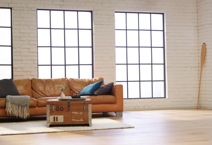 steffi b&uuml;hlmaier steffibuehlmaier - miele - commercial film set - sofa in front of industrial windows