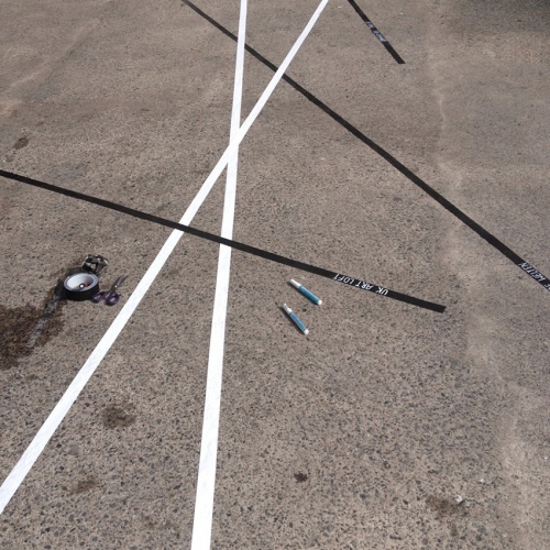 steffi b&uuml;hlmaier steffibuehlmaier - converse - shop styling props - lines on asphalt floor